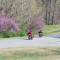 Tennessee - Group of motorcycles passing by milepost 440 parking area. 
