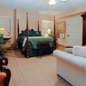 Joseph Neibert Room - bedroom w/ queen bed and sitting area