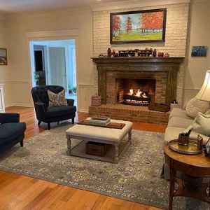 Spacious living room with fireplace near Ross Barnett Reservoir