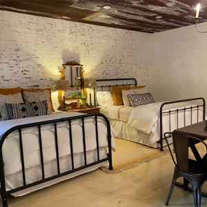 Two Queen Size Beds at Southern Grace Cottage